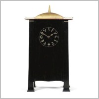 Voysey, Mantle clock, on invaluable.co.uk (Sotheby's).jpg